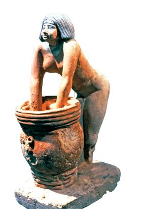 Kobieta warząca piwo, Egipt, III tys. p.n.e.