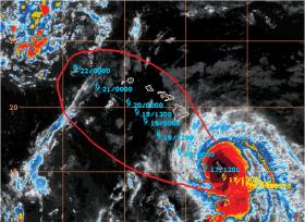 Satelitarne zdjęcie huraganu Anna z prognozowaną drogą jego przemieszczania się w rejonie Hawajów na Pacyfiku, październik 2014 r.