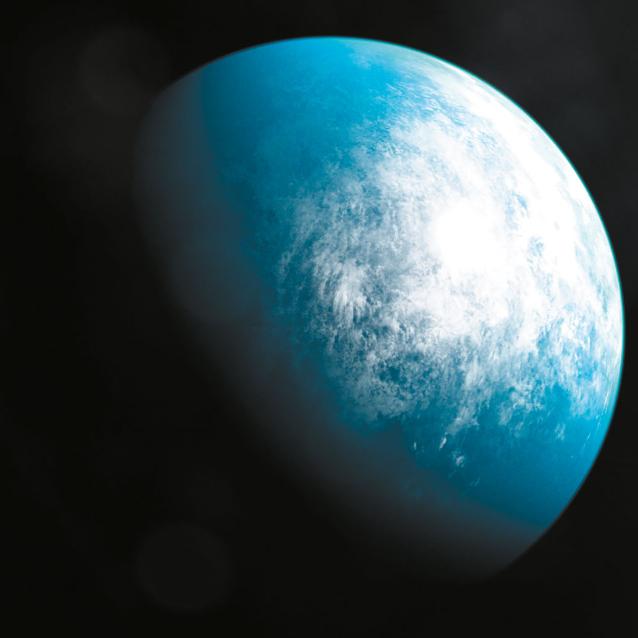 Ilustracja przedstawia TOI-700 d, pierwszą planetę wielkości Ziemi mogącą podtrzymywać życie, odkrytą przez wystrzelonego przez NASA satelitę Transiting Exoplanet Survey Satellite. Glob ten krąży wokół gwiazdy oddalonej o 100 lat świetlnych w gwiazdozbiorze Złota Ryba.