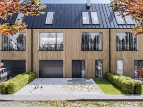 Dach bez okapów sprawia, że zacierają się granice między połacią dachową a elewacją.