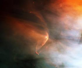 Wiatr promieni kosmicznych powstały ze zderzenia gwiazdy LL.Orionis z mgławicą Oriona. Zdjęcie z 1995 r.