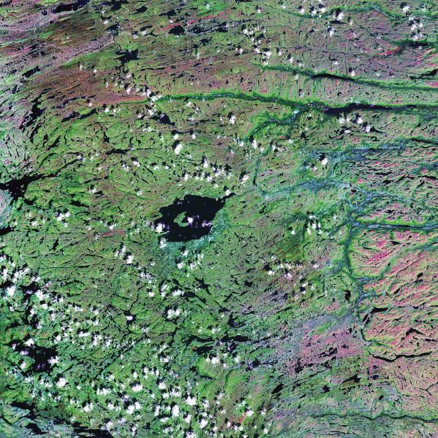Jezioro Mistastin na półwyspie Labrador wypełnia krater meteorytowy sprzed 36 mln lat (na środku). Zdjęcie wykonane przez satelitę Landsat 7.