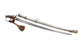 Szabla ufundowana 6 sierpnia 1916 r. przez oficerów I Brygady Legionów, Piłsudski miał ją u boku, gdy został naczelnikiem państwa; wykonana przez firmę Weyersberg Co. w Solingen, stała się pierwowzorem szabel oficerskich piechoty legionowej, głownia z damasceńskiej stali, rękojeść z mosiądzu, trzon pokryty skórą rekina.