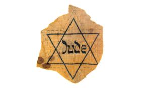 Oznaka, którą Żydzi byli obowiązani nosić na terenie Trzeciej Rzeszy.