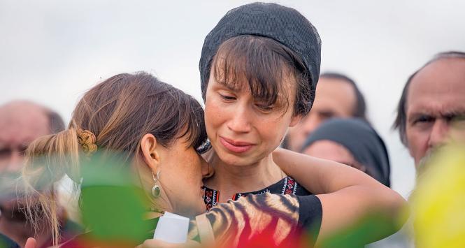 Tetiana Czornowoł na pogrzebie męża, który zginął podczas walk na wschodzie Ukrainy.
