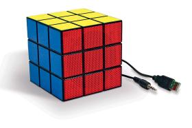 Głośnik Rubika. Kostka Rubika to hit lat 80. Niektórzy pokochali ją tak, że nie mogą się bez niej obejść. Owoc tej miłości to głośnik. Po podpięciu do portu USB można go podłączyć do źródła dźwięku (komputer, MP3) www. ministerstwogadzetów  Cena: 97 zł.