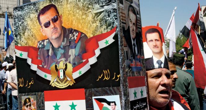 Zwolennicy syryjskiego reżimu Asadów na ulicach Damaszku.
