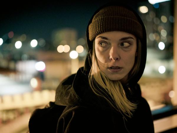 Magdalena Koleśnik jako dziennikarka Julita Wójcicka, główna bohaterka filmu „Ukryta sieć”.