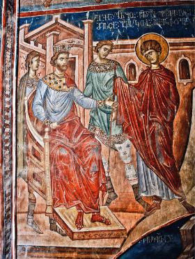 Święty Jerzy stoi przed swoim prześladowcą, cesarzem Dioklecjanem; obraz mistrza Gerasime, XIV w.