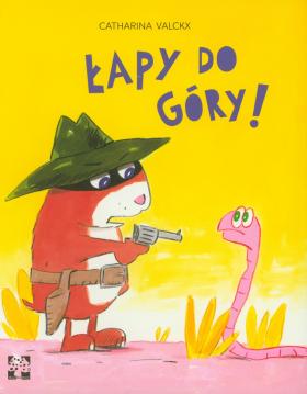 Catharina Valckx, Łapy do góry, Muchomor, Warszawa 2017. Mały Billy ma ojca rewolwerowca. Billy zgodnie z założeniami seniora powinien pielęgnować rodzinną tradycję, więc pewnego dnia dostaje dwa nienabite pistolety i zadanie: wybrać się na pierwszą bandycką eskapadę, by zastraszyć kilka zwierzaków. I choć Billy bardzo chce być jak tata, kompletnie mu to nie wychodzi. Co więcej, chcąc zło czynić, czyni dobro. I w dodatku zdobywa przyjaciół. Catharina Valckx jest lapidarna i bezpośrednia, zarówno na poziomie fabuły, jak i rysunku. Ale w tym przypadku to ogromna zaleta.