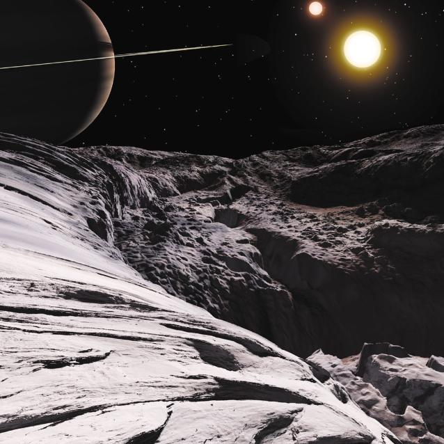 Hipotetyczny widok z planety w układzie planetarnym Kepler-16 z gwiazdą podwójną (wizja artysty).