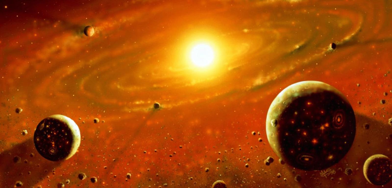 Formowanie się dysku planetarnego otaczającego młode Słońce. Skaliste planety powstają w wyniku szybkiego gromadzenia się drobin materii kosmicznej.