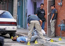 Ofiara wojny gangów narkotykowych w Ciudad Juárez przy granicy z USA.