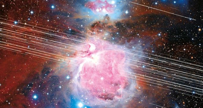 Satelity Starlink na tle Wielkiej Mgławicy w Orionie (M42).