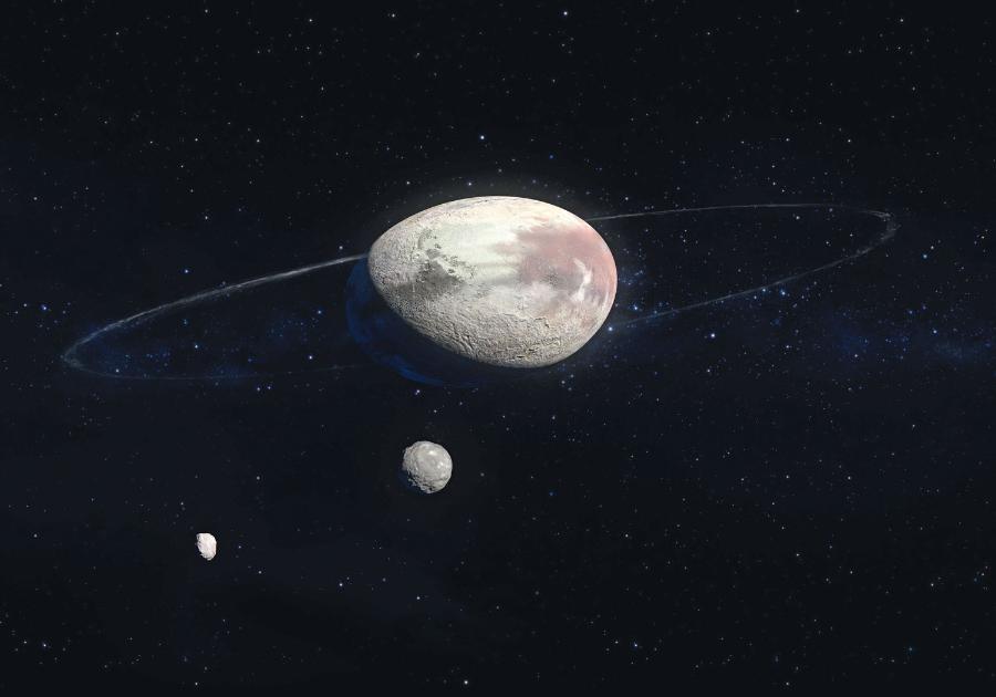 Plutoid Haumea. Leży w Pasie Kuipera niedaleko Plutona. Ma mocno spłaszczony kształt, dzięki czemu pierścienie materii mogą długo utrzymywać się wokół niego.