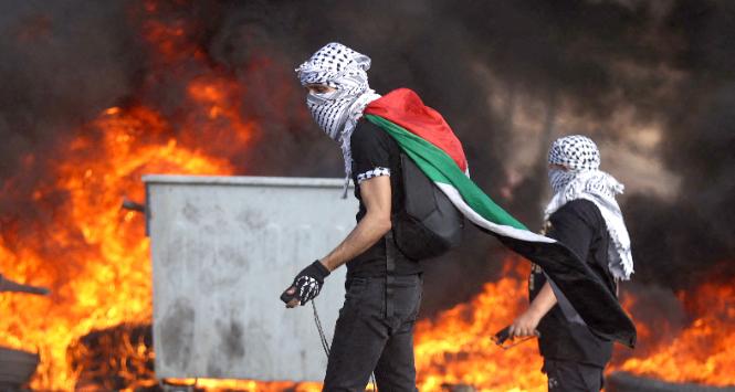 Zamieszki z izraelskimi siłami nieopodal Ramallah, 13 października 2023 r.