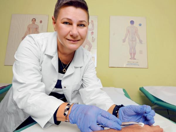 Dlaczego ból kręgosłupa leczy się w stopie