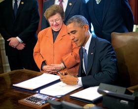 Tu z Barackiem Obamą. Obydwoje byli przeciw interwencji w Iraku.