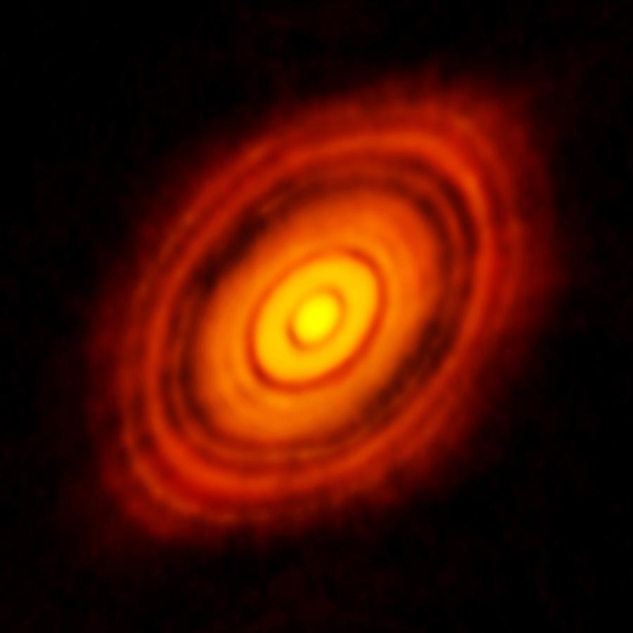 Dysk protoplanetarny wokół gwiazdy HL Tau. Pierwsze wysokiej rozdzielczości obserwacje wykonane przez ALMA.