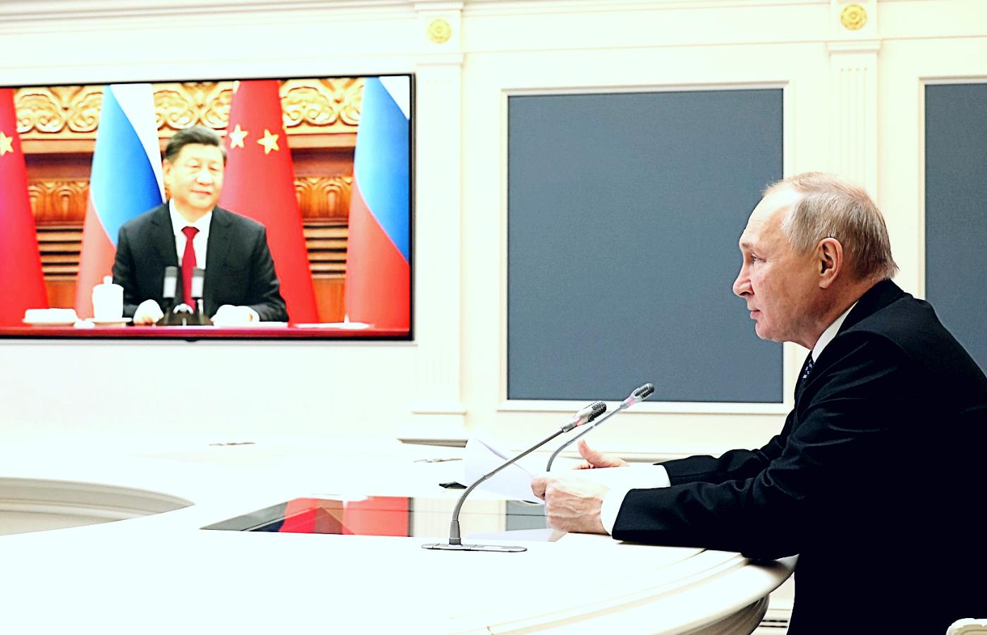 Władimir Putin podczas wideospotkania z przywódcą Chin Xi Jinpingiem, 30 grudnia 2022 r.