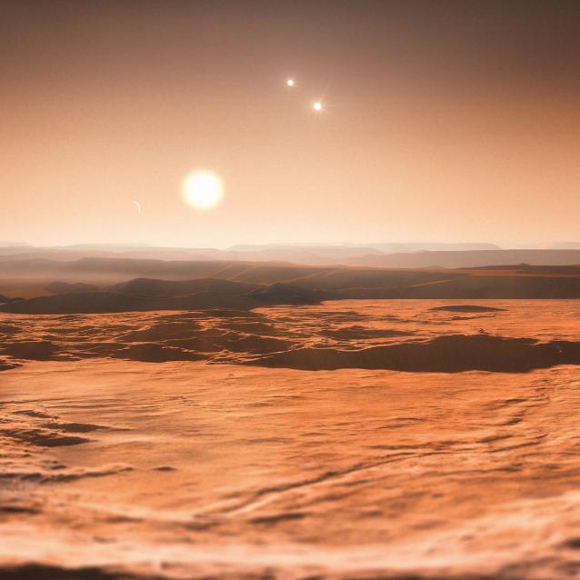 Wizualizacja układu Gliese 667. To trzy gwiazdy, a wokół najmniejszej z nich na pewno krążą dwie planety.